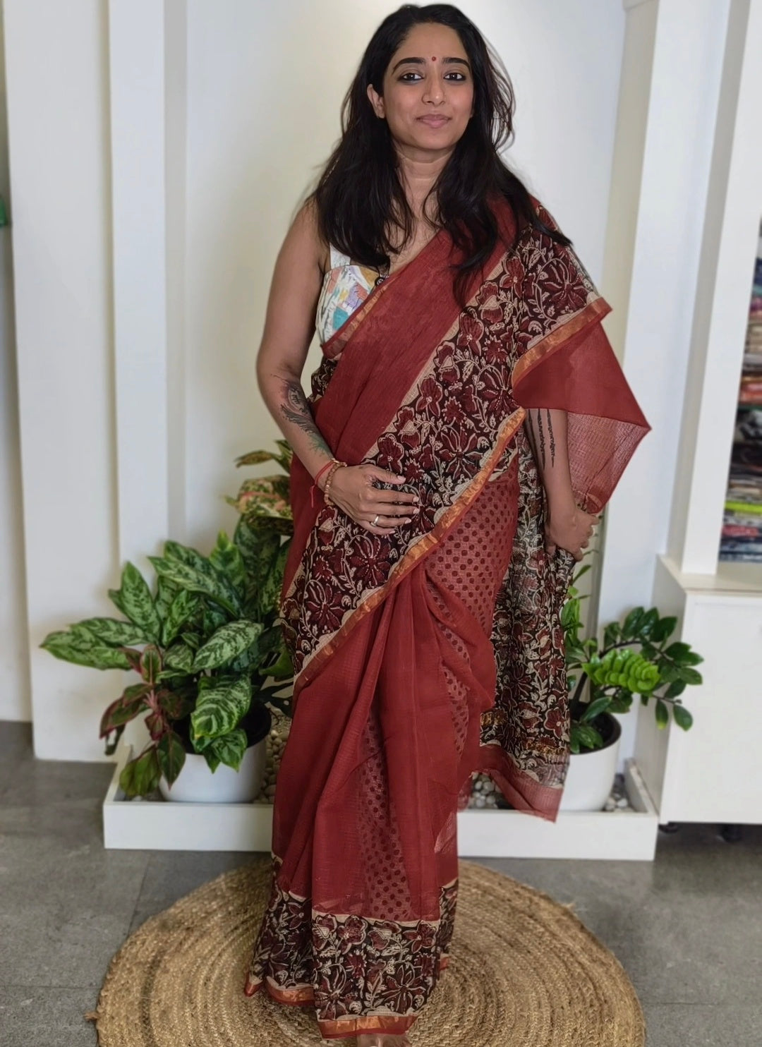 Kota Doria cotton saree - brick red with black floral border