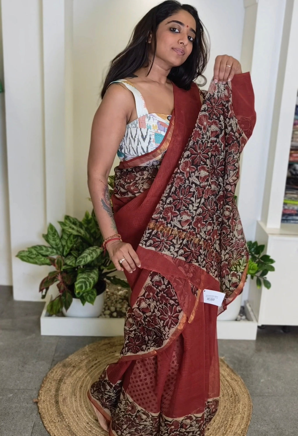 Kota Doria cotton saree - brick red with black floral border