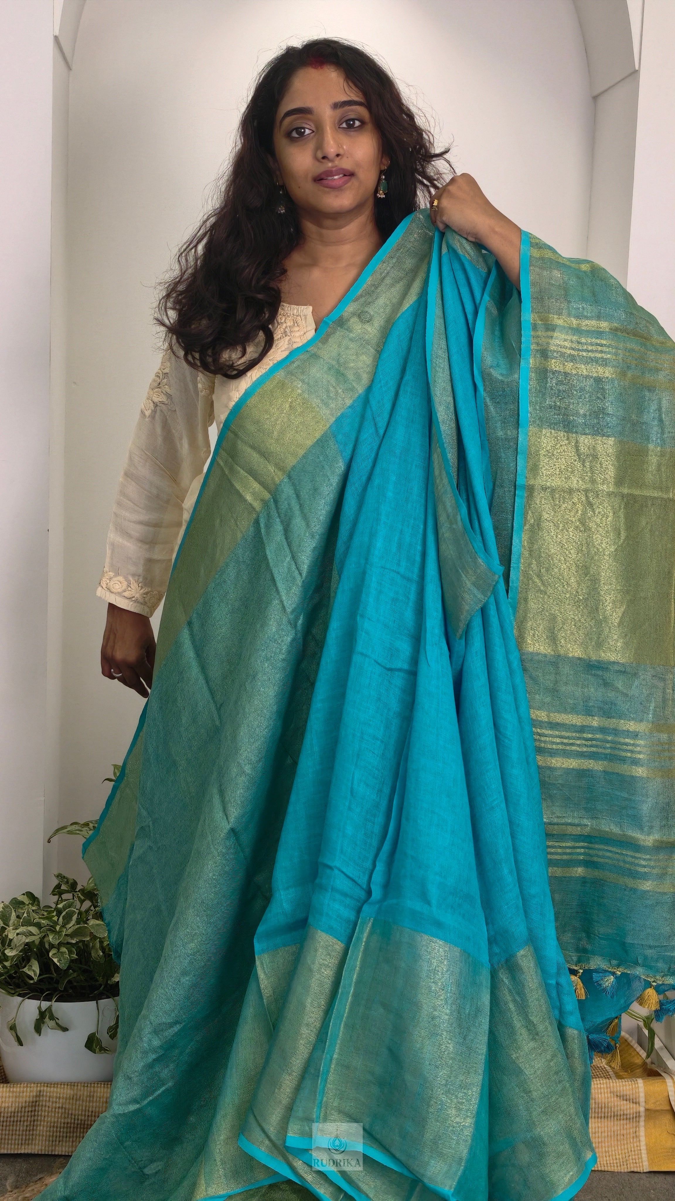 Linen saree - aqua blue with gold zari border