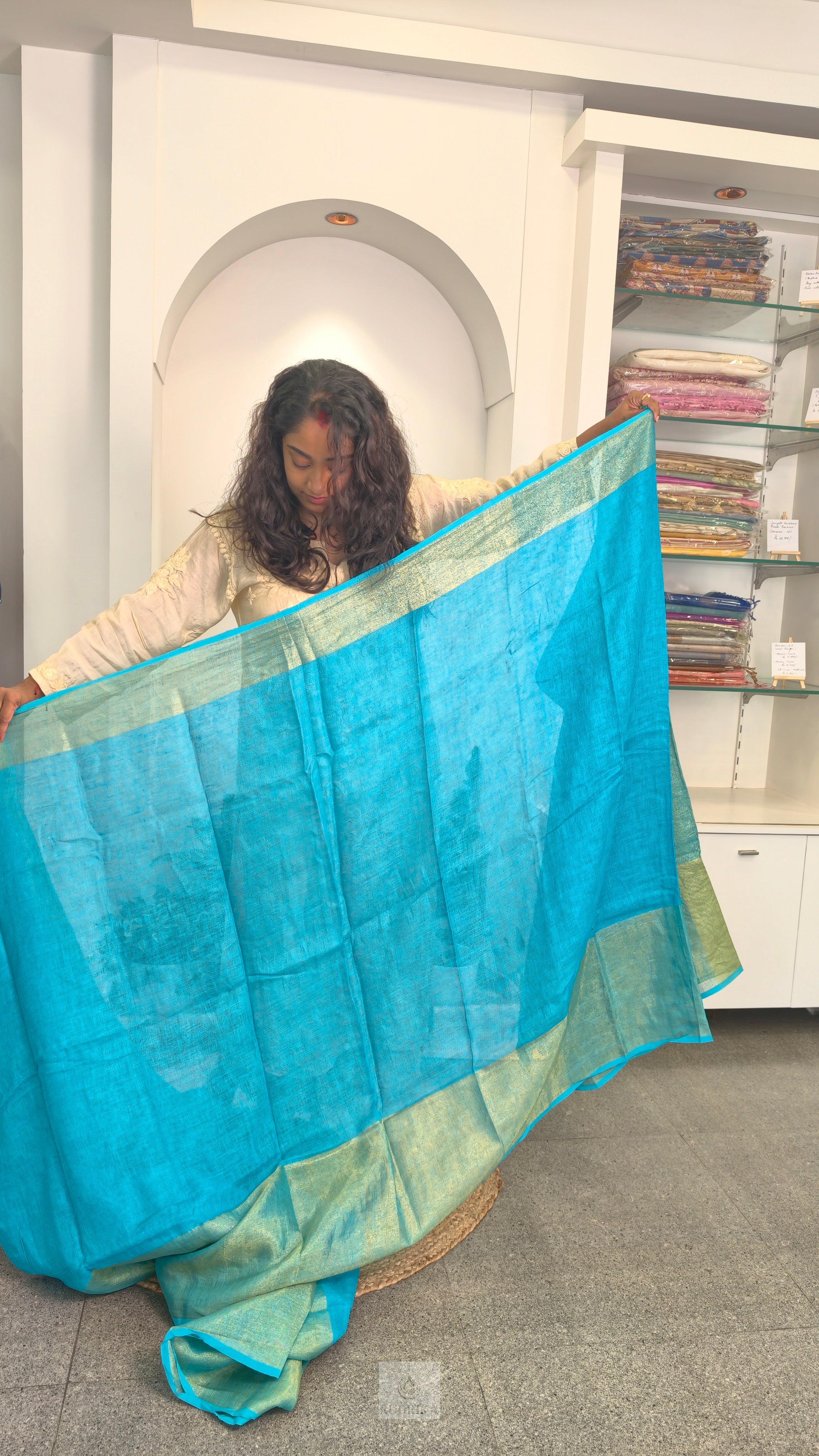 Linen saree - aqua blue with gold zari border